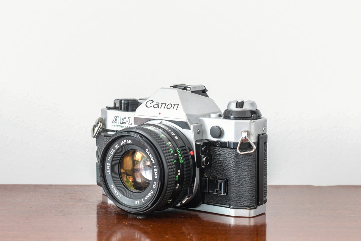 Stunning Canon AE1 Program 35mm SLR Film Camera + 50mm Canon FD F1.8 Lens