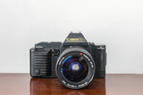 1980s Canon T70 35mm SLR Film Camera with Tokina 28-85mm Zoom Lens