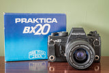 Boxed Praktica BX20 35mm Film Camera + Praktica Auto-Zoom F3.5-4.5 35-70mm Zoom Lens